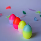 eikerzen in neon als 4er Set verpackt im schönen Karton. Sofort als Geschenk zu übergeben. 
Candles in egg shape for easter decorations.