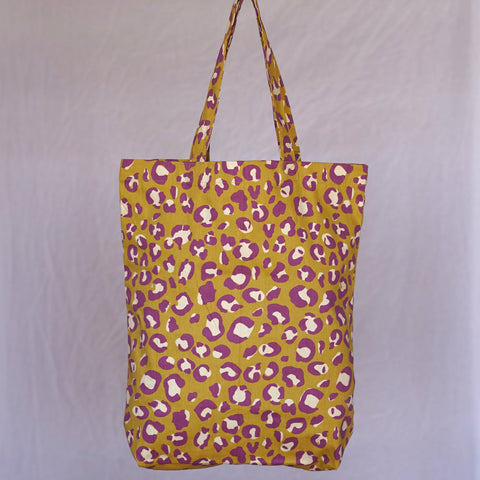 leopardenmuster tasche aus baumwolle von kleine fete in den farben lila creme und olivgrün